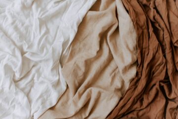 sustainable fabrics clothing with natural fibers cotton wool linen garments.